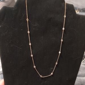 Elegant Gold Necklace with Silver Accents